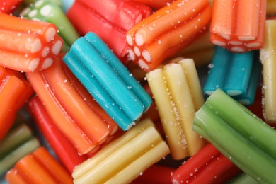 Photo of Many colorful jelly candies as background, closeup