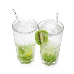 Photo of Glasses of refreshing drink with kiwi isolated on white