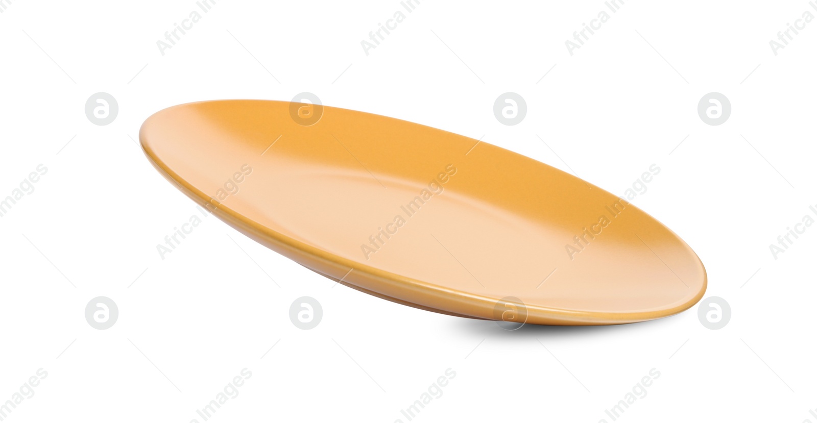 Photo of One orange ceramic plate isolated on white