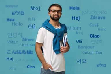 Portrait of happy translator and greeting words in different foreign languages on light blue background