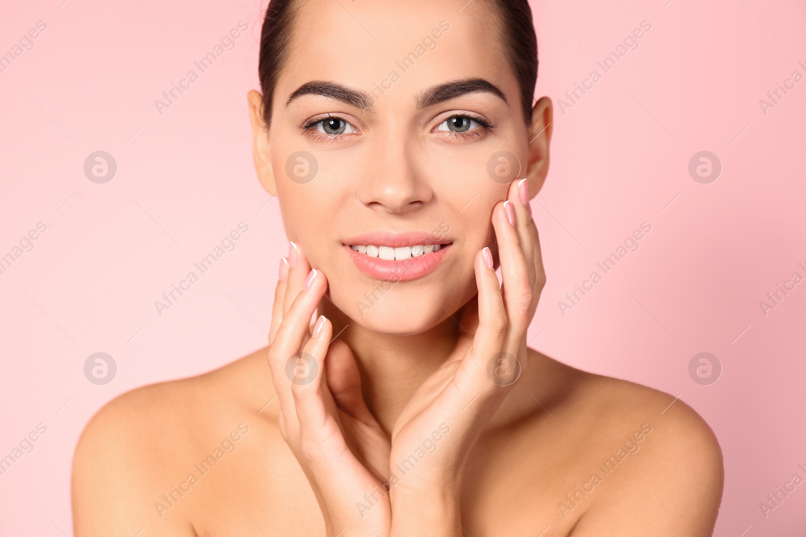 Photo of Portrait of beautiful young woman on color background. Lips contouring, skin care and cosmetic surgery concept