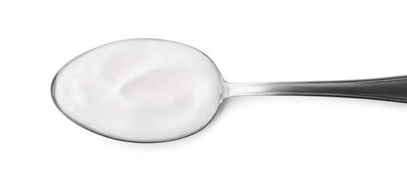 Delicious natural yogurt in spoon isolated on white, top view