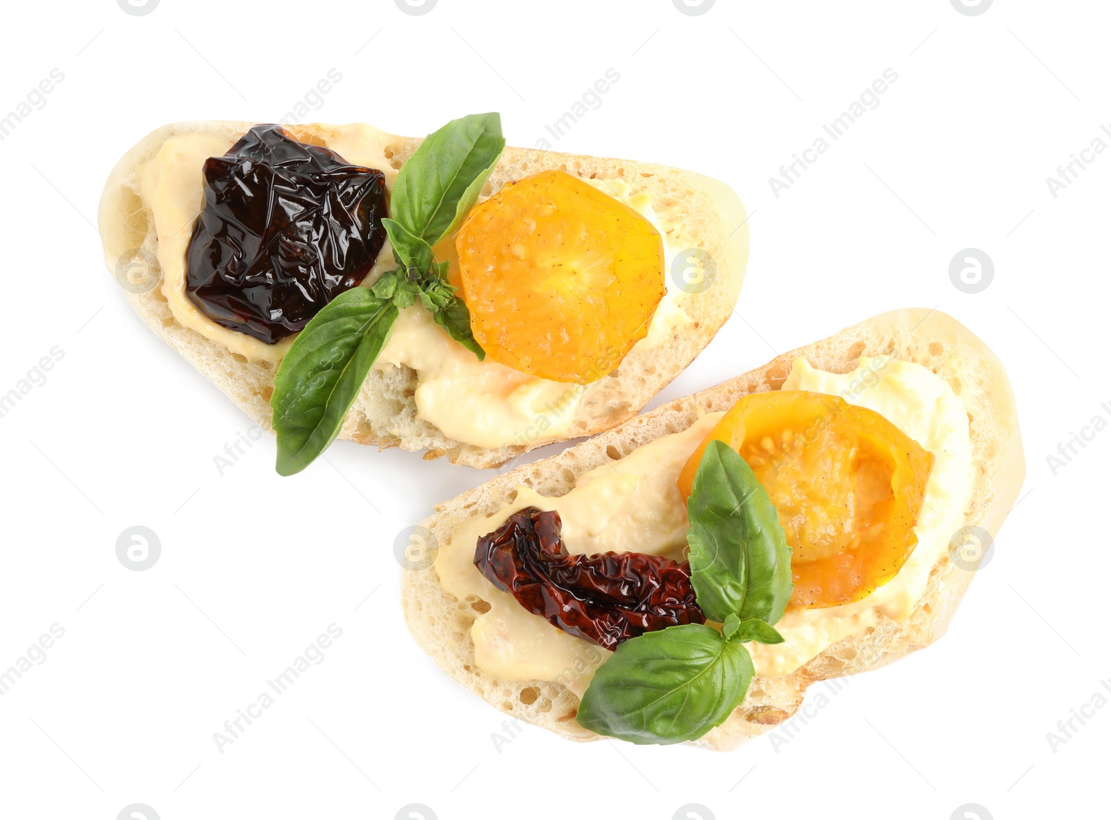 Photo of Tasty fresh tomato bruschettas on white background, top view