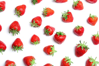 Photo of Composition with ripe red strawberries on light background