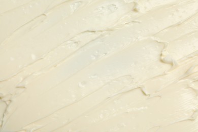 Photo of Texture of tasty butter as background, top view