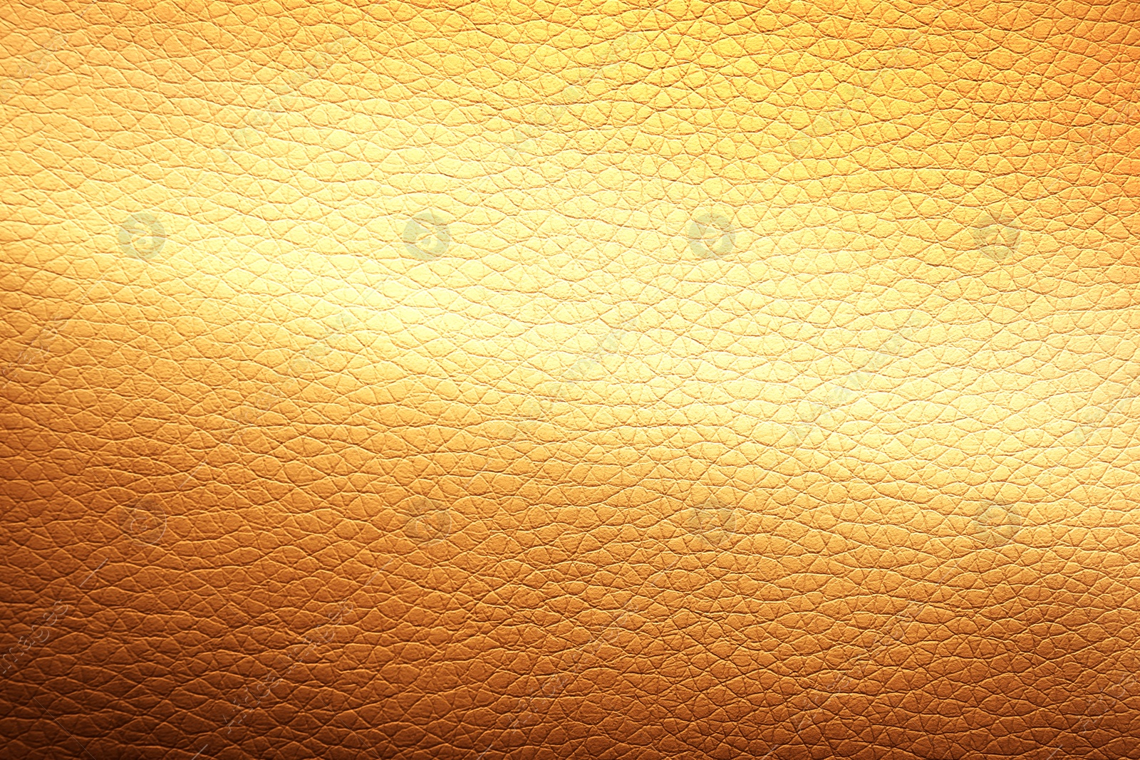 Image of Golden textured surface as background, closeup view