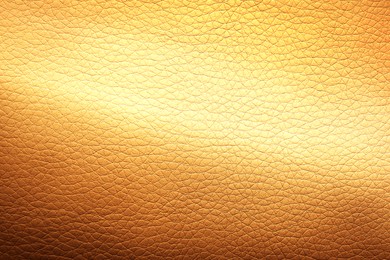 Image of Golden textured surface as background, closeup view