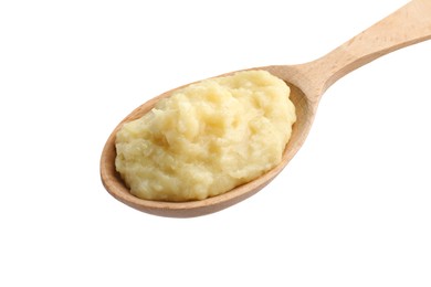 Photo of Wooden spoon of tasty mashed potatoes isolated on white