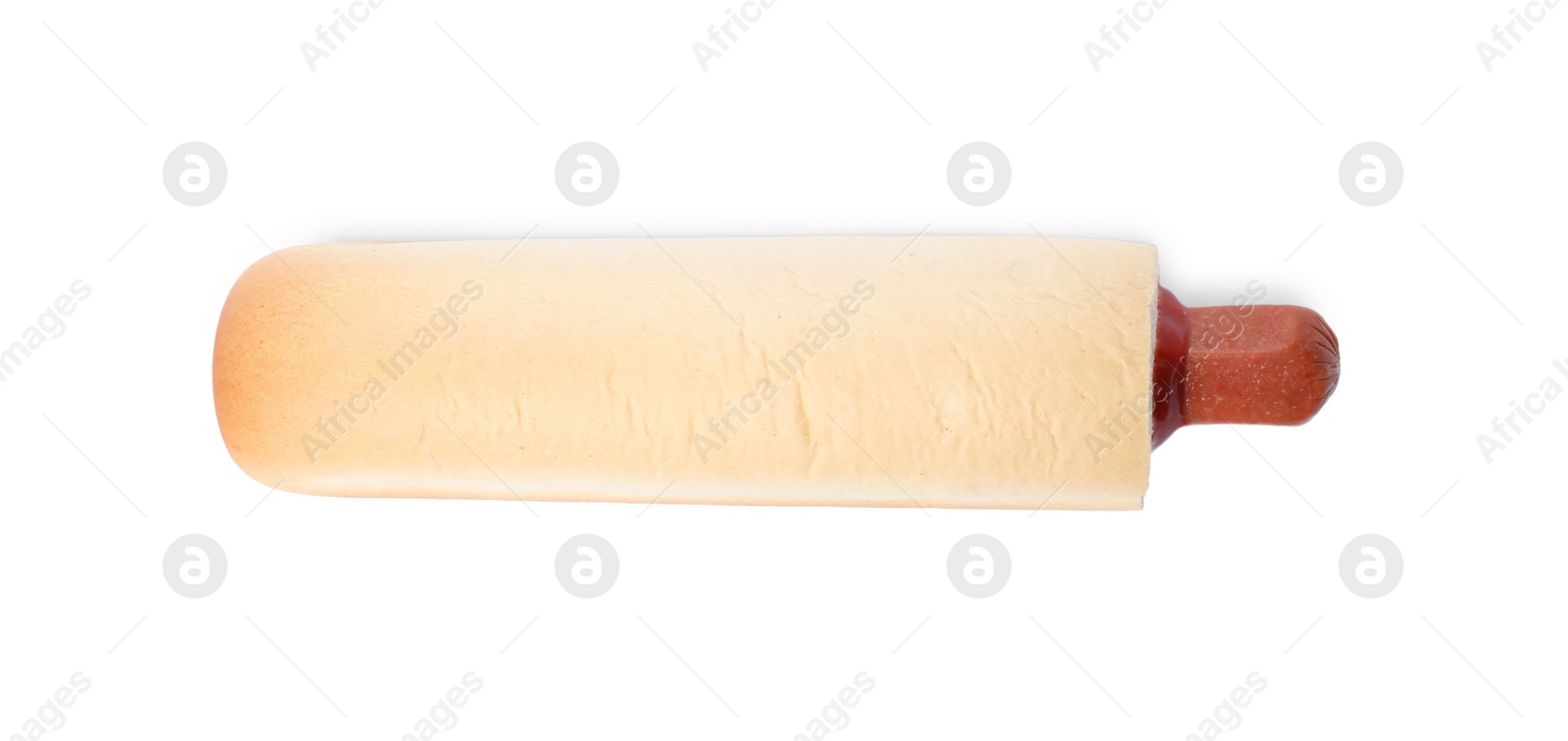 Photo of Tasty french hot dog with ketchup isolated on white, top view