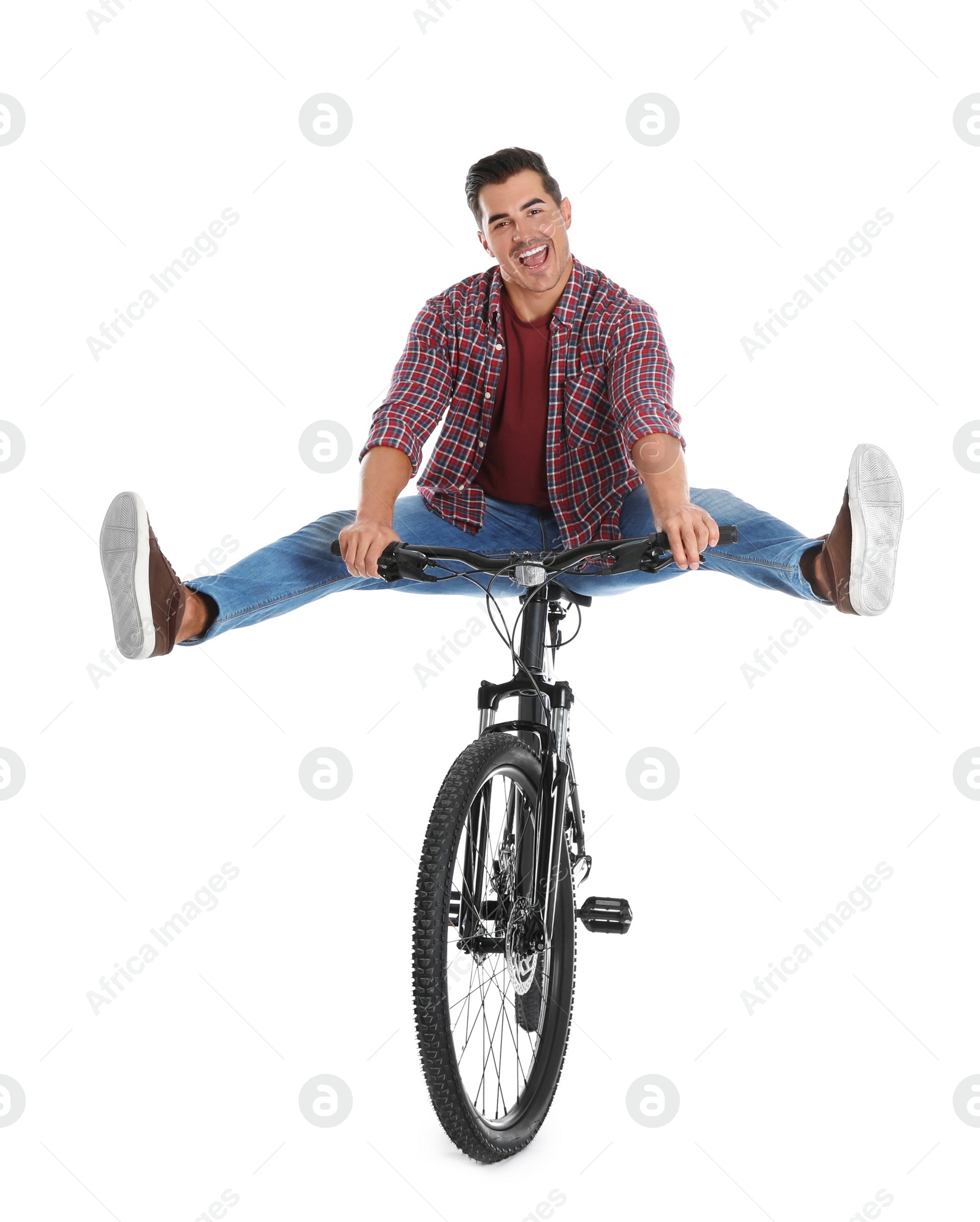 Photo of Handsome young man with modern bicycle on white background