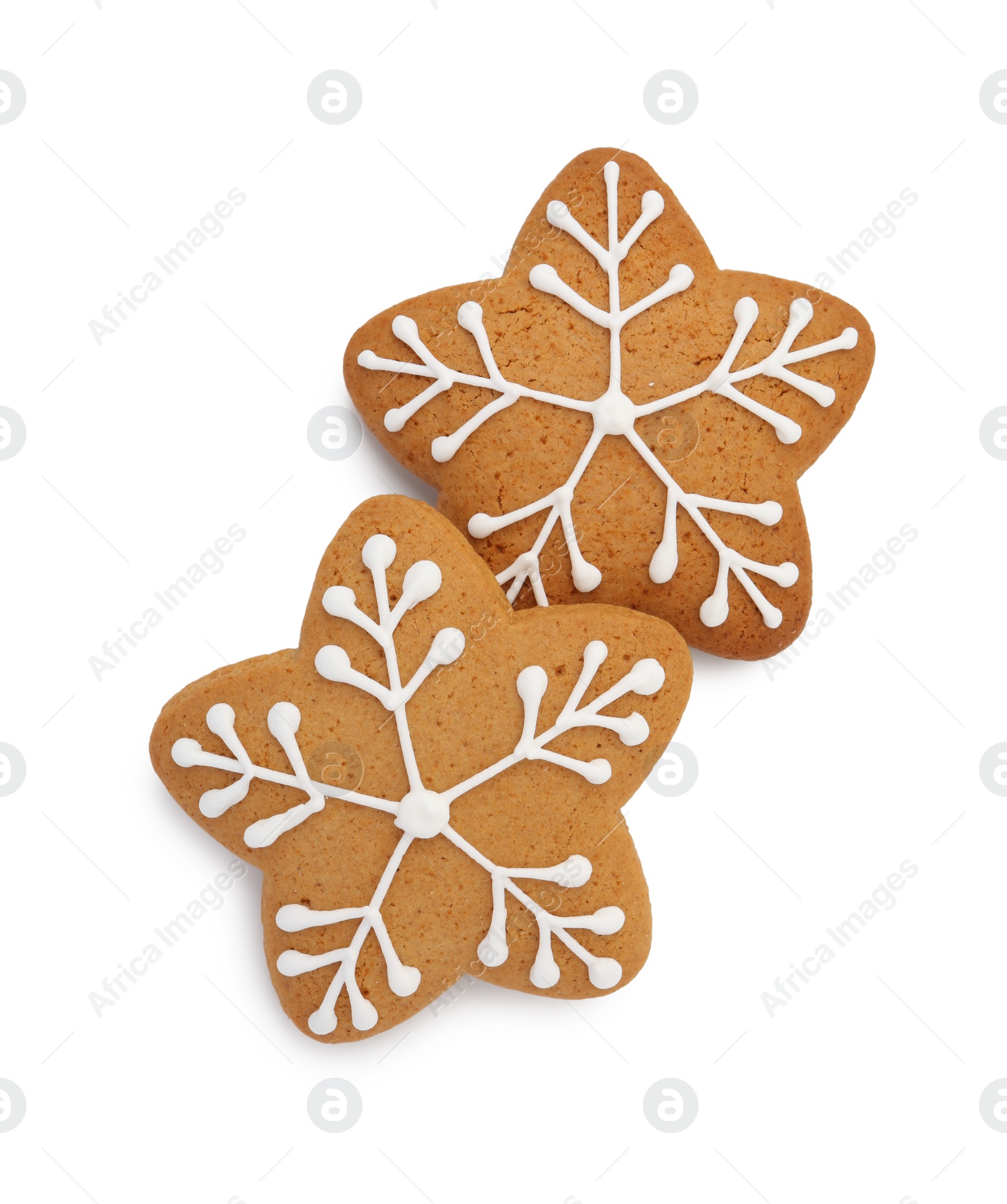 Photo of Tasty star shaped Christmas cookies with icing isolated on white, top view