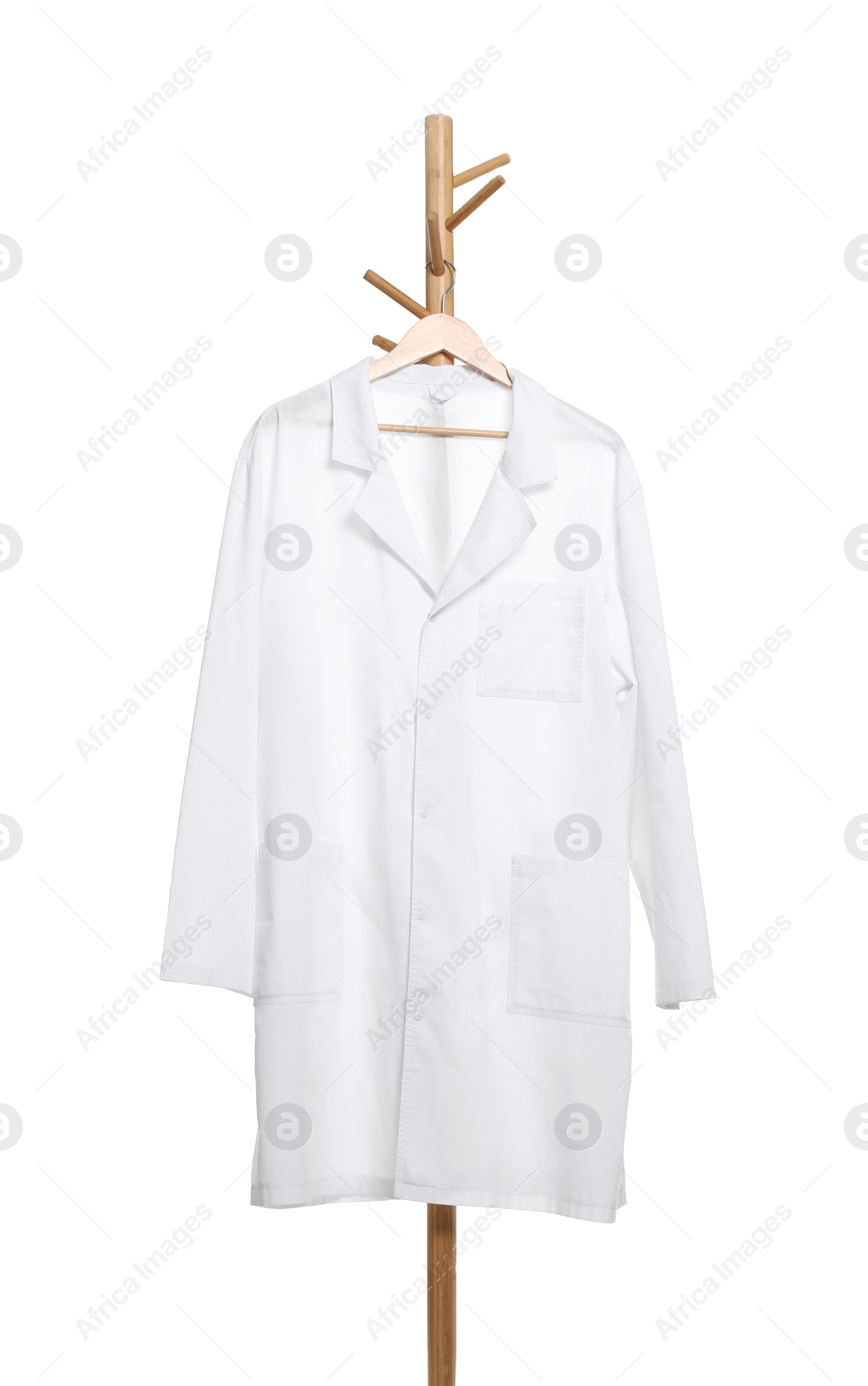 Photo of Doctor's gown on rack against white background. Medical uniform