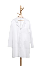 Photo of Doctor's gown on rack against white background. Medical uniform