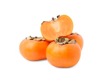 Photo of Whole and cut delicious ripe juicy persimmons on white background