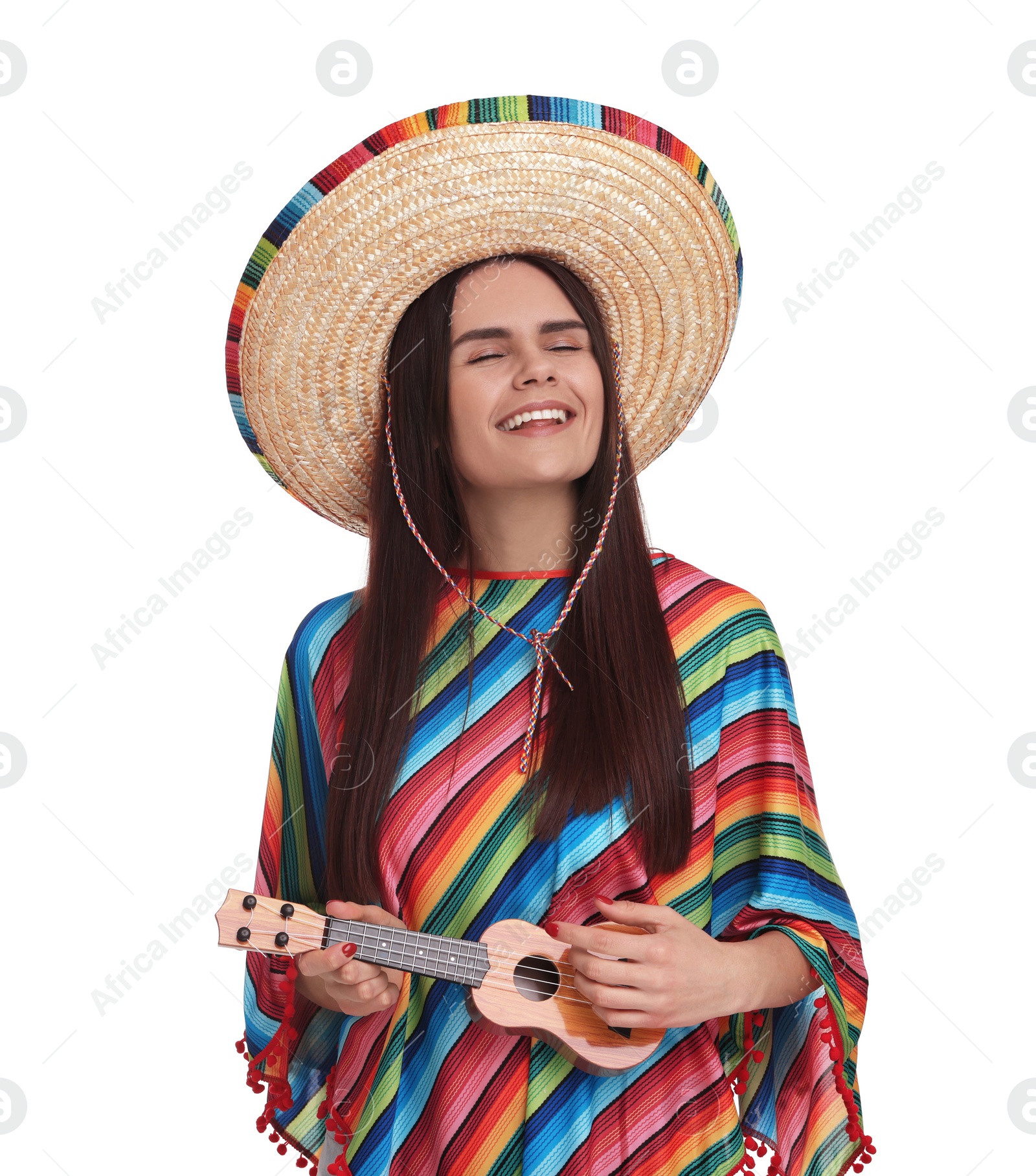 Photo of Young woman in Mexican sombrero hat and poncho playing ukulele on white background