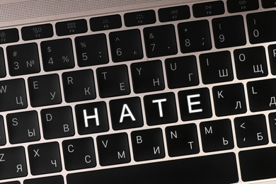 Image of Buttons with text Hate on computer keyboard, top view