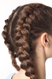 Photo of Woman with braided hair on light background, closeup