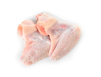 Photo of Raw chicken wings on white background, top view. Fresh meat