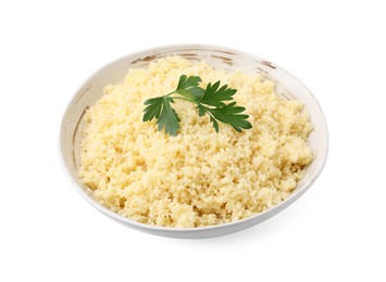 Tasty couscous and fresh parsley in bowl isolated on white