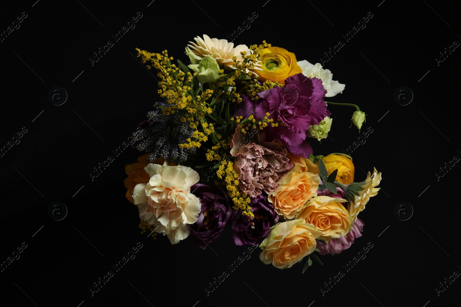 Photo of Beautiful bouquet of fresh flowers on dark background