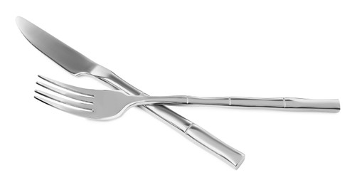 Fork and knife isolated on white. Stylish shiny cutlery set