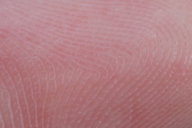 Photo of Friction ridges on finger as background, macro view