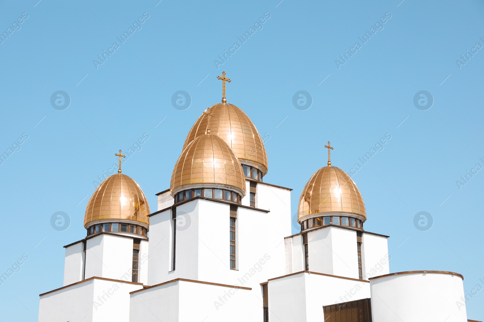 Photo of Lviv, Ukraine - May 1, 2022: Nativity of Holy Virgin Church against blue sky