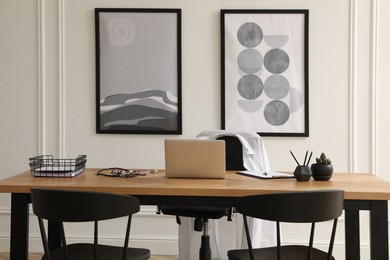 Photo of Modern doctor's workplace in stylish office. Interior design