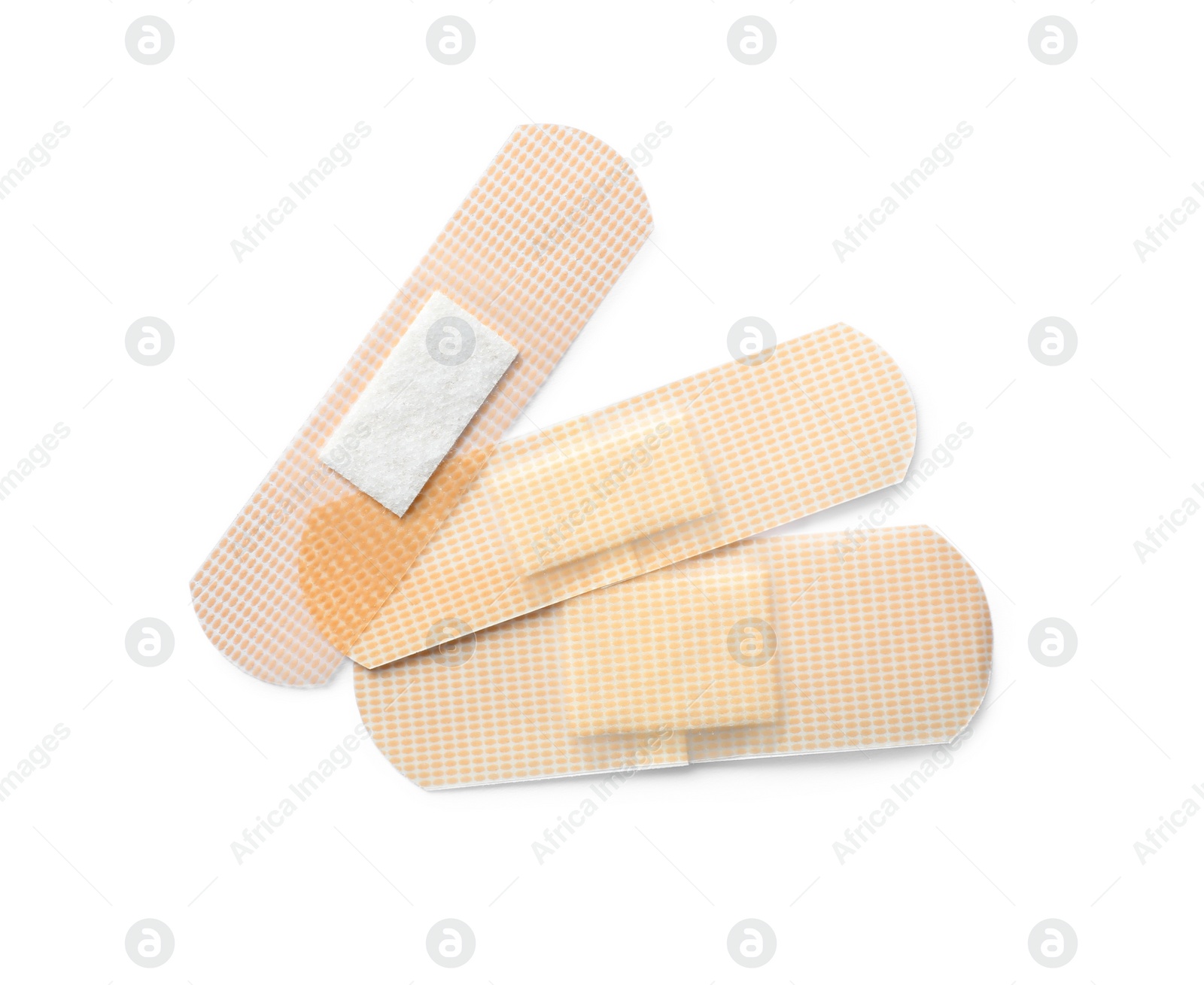 Medical sticking plasters isolated on white. First aid item Photo of Medical sticking plasters isolated on white. First aid item