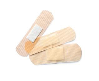 Photo of Medical sticking plasters isolated on white. First aid item