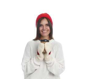 Photo of Happy beautiful woman with paper cup of mulled wine on white background