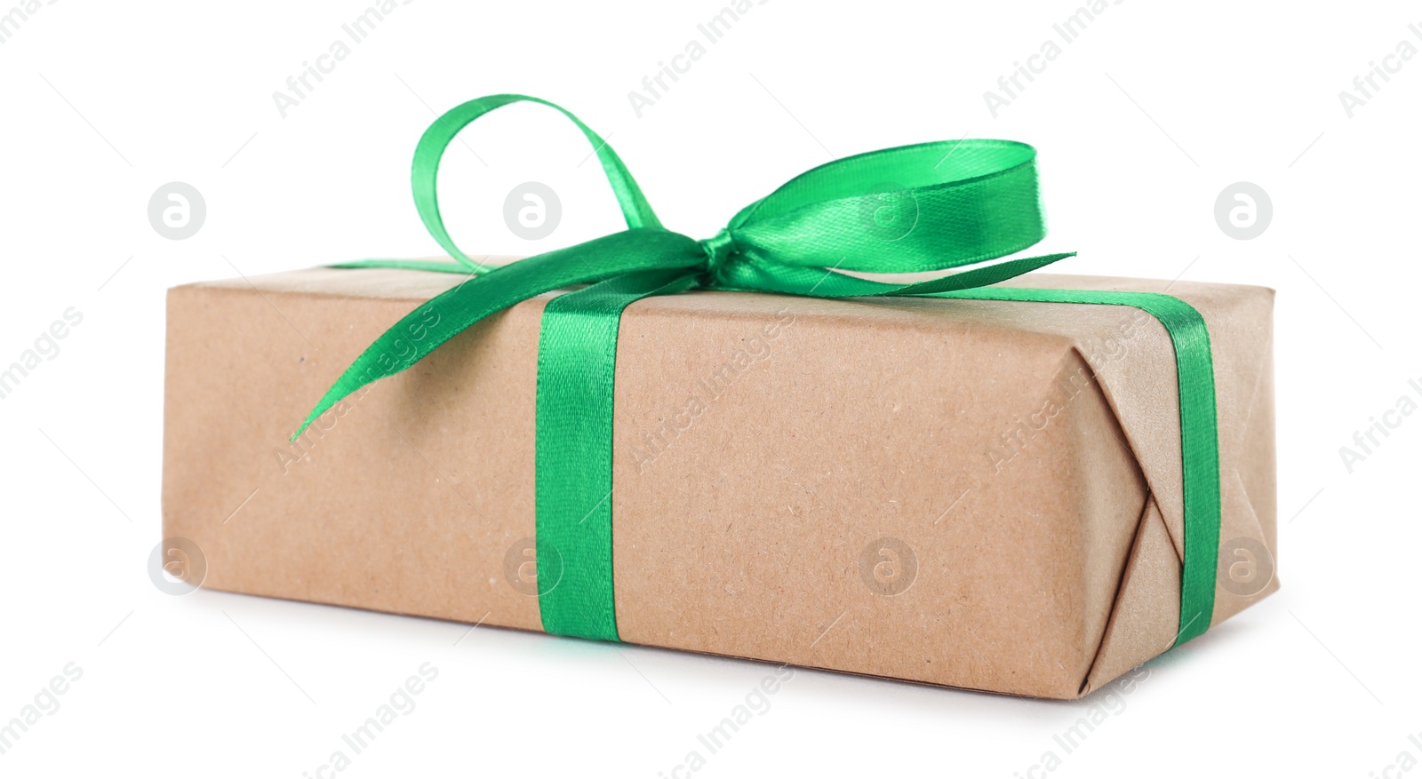 Photo of Christmas gift box decorated with ribbon bow on white background