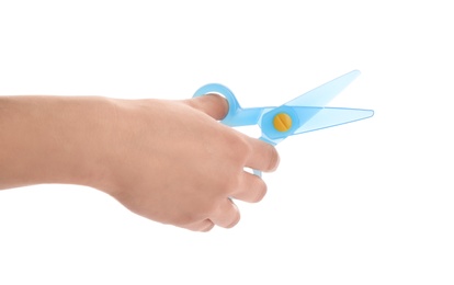 Photo of Woman holding colorful plastic scissors on white background, closeup