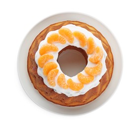 Photo of Homemade yogurt cake with tangerines and cream on white background, top view