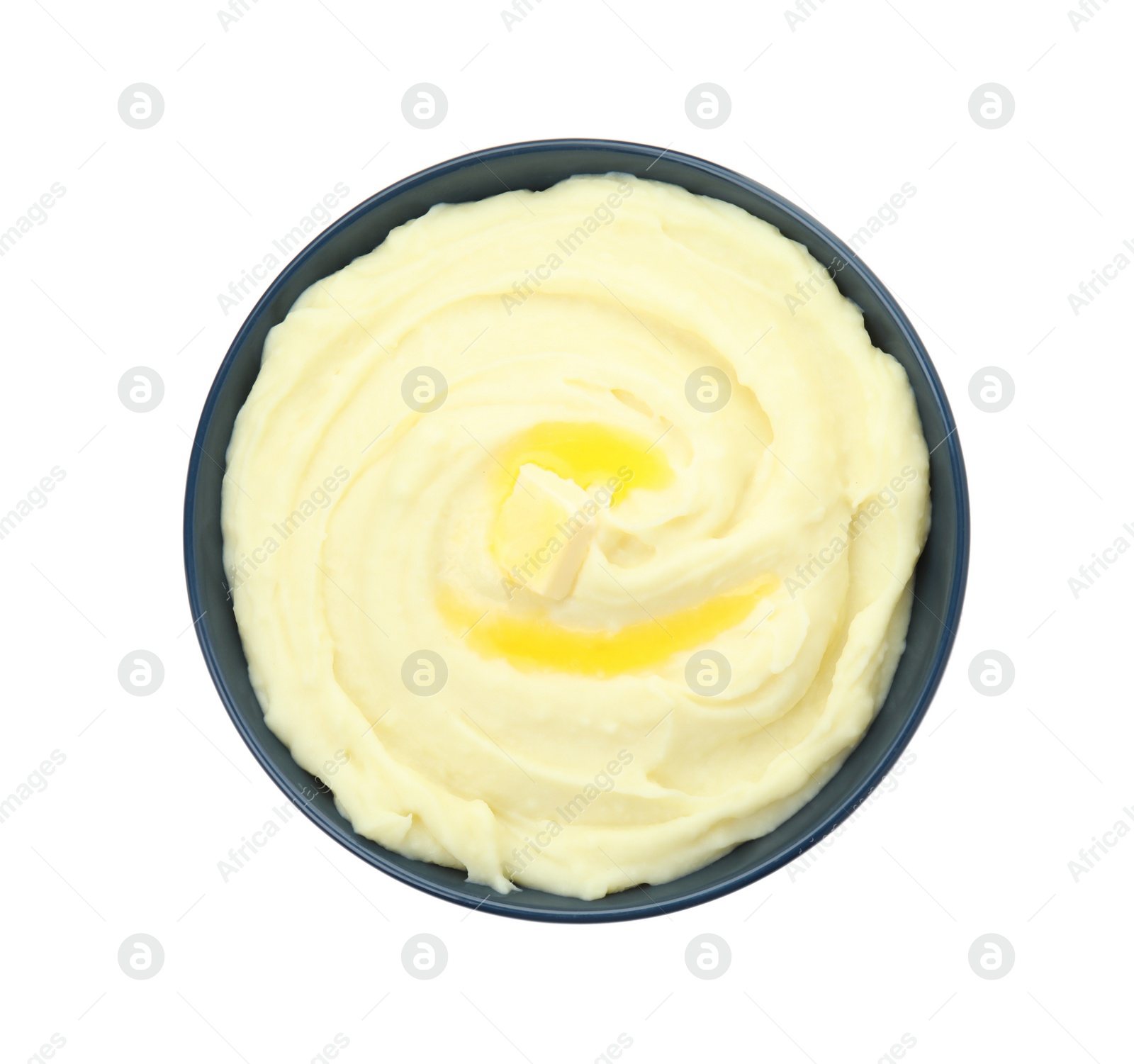 Photo of Bowl with freshly cooked homemade mashed potatoes isolated on white, top view