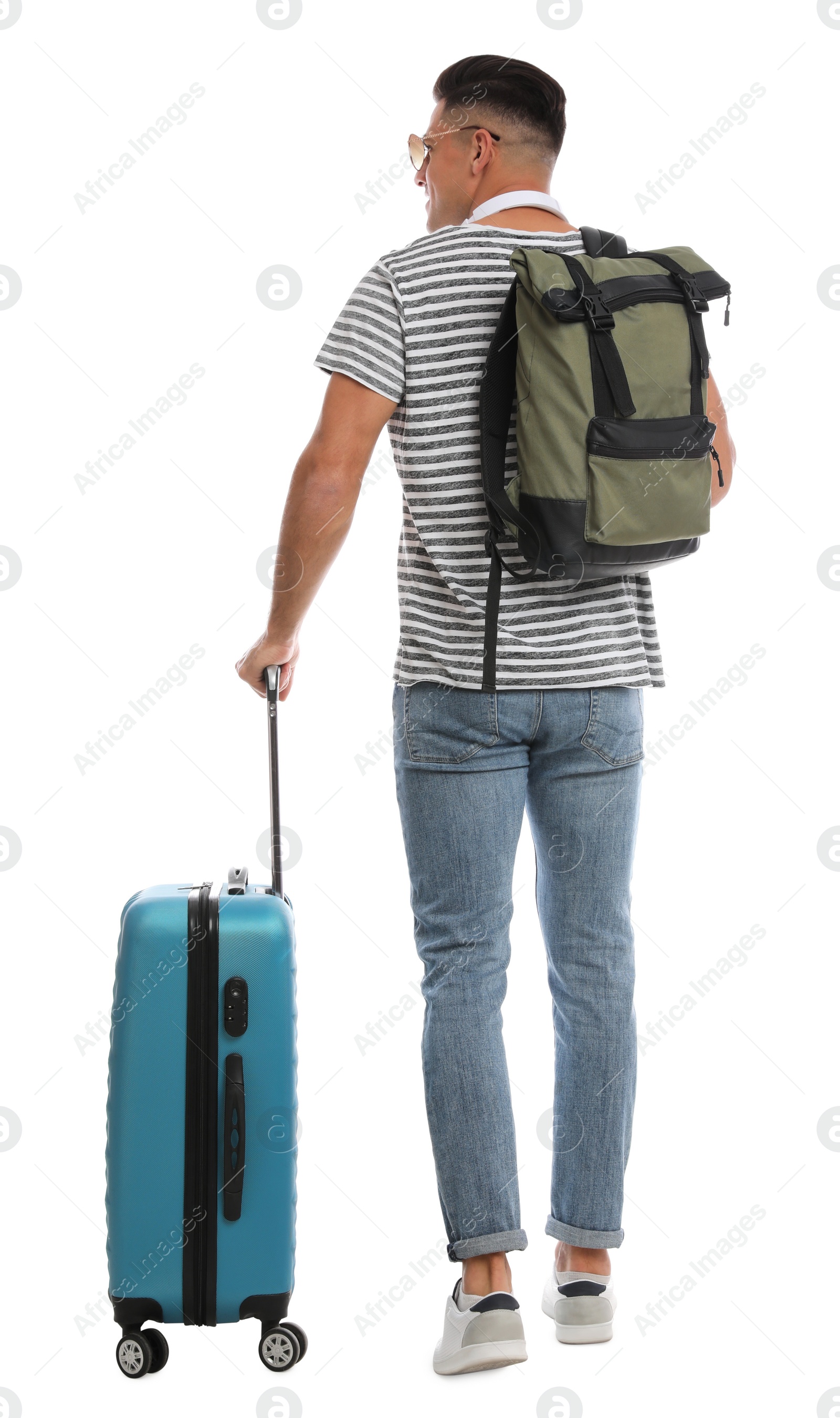 Photo of Man with backpack and suitcase on white background, back view. Summer travel