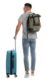 Photo of Man with backpack and suitcase on white background, back view. Summer travel