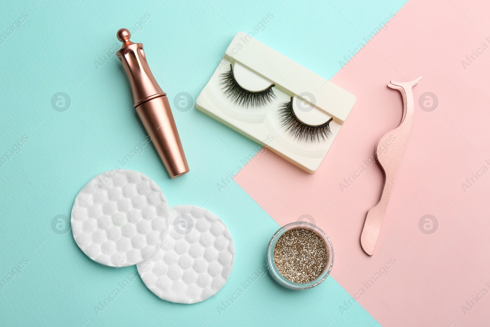 Photo of Flat lay composition with magnetic eyelashes and accessories on color background