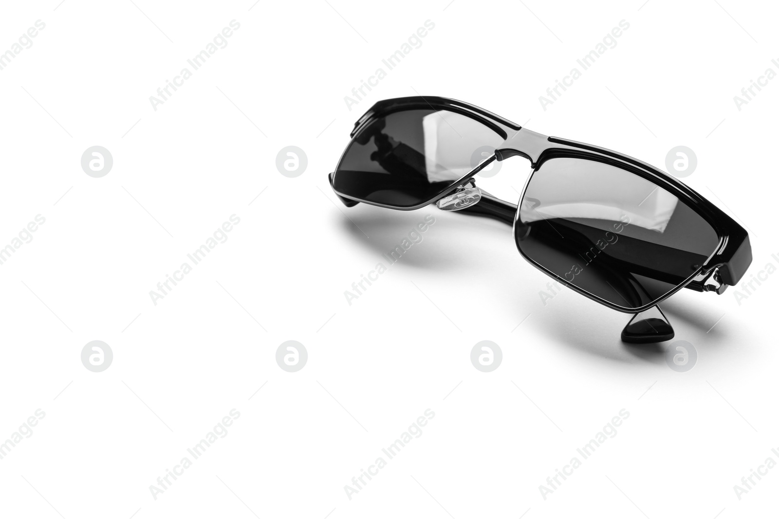 Photo of Stylish sunglasses on white background. Fashionable accessory