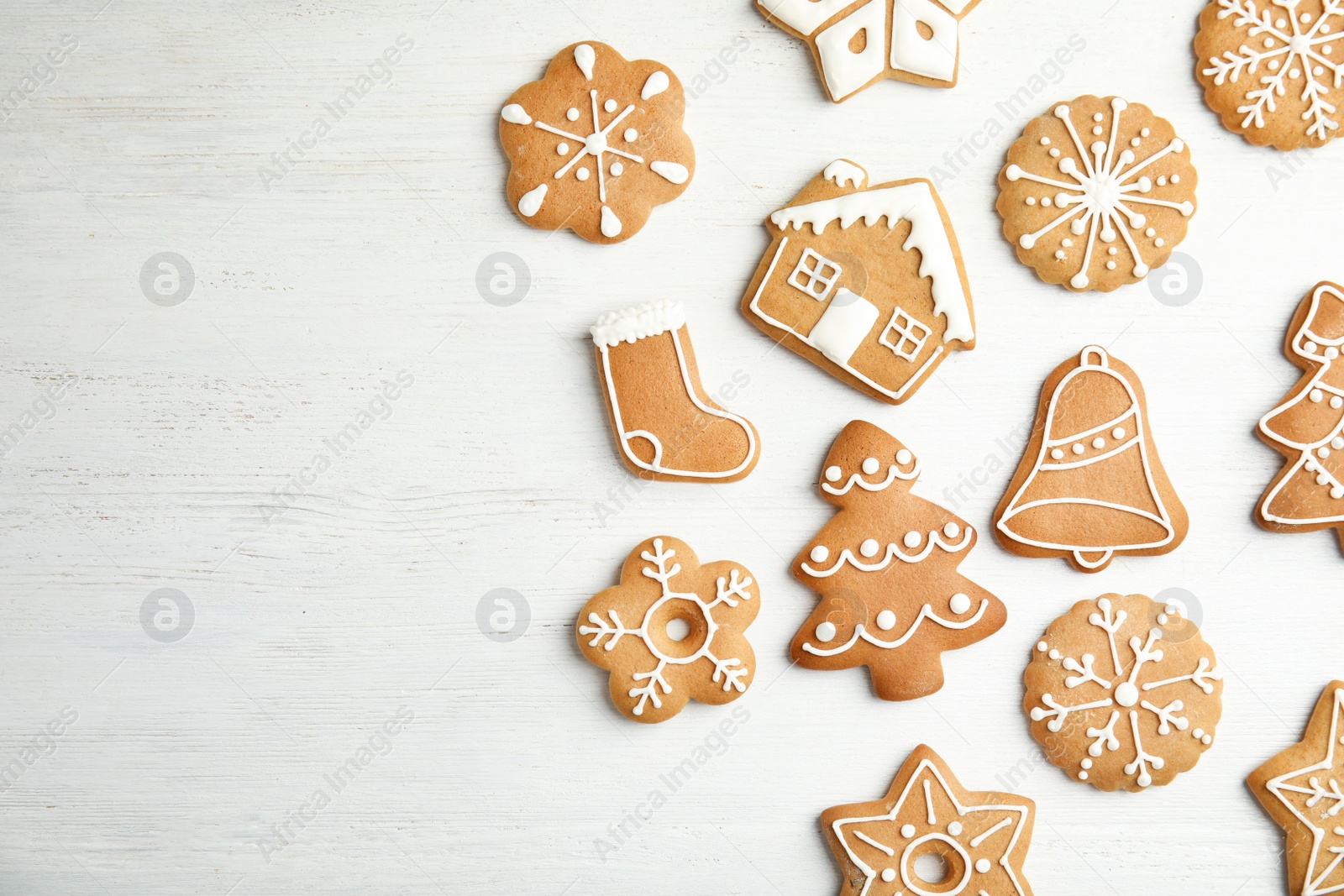 Photo of Tasty homemade Christmas cookies on wooden background, top view