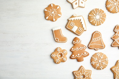 Tasty homemade Christmas cookies on wooden background, top view