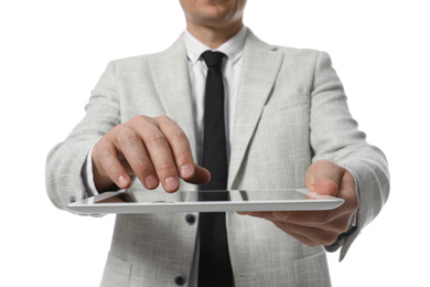 Photo of Businessman using tablet computer on white background, closeup