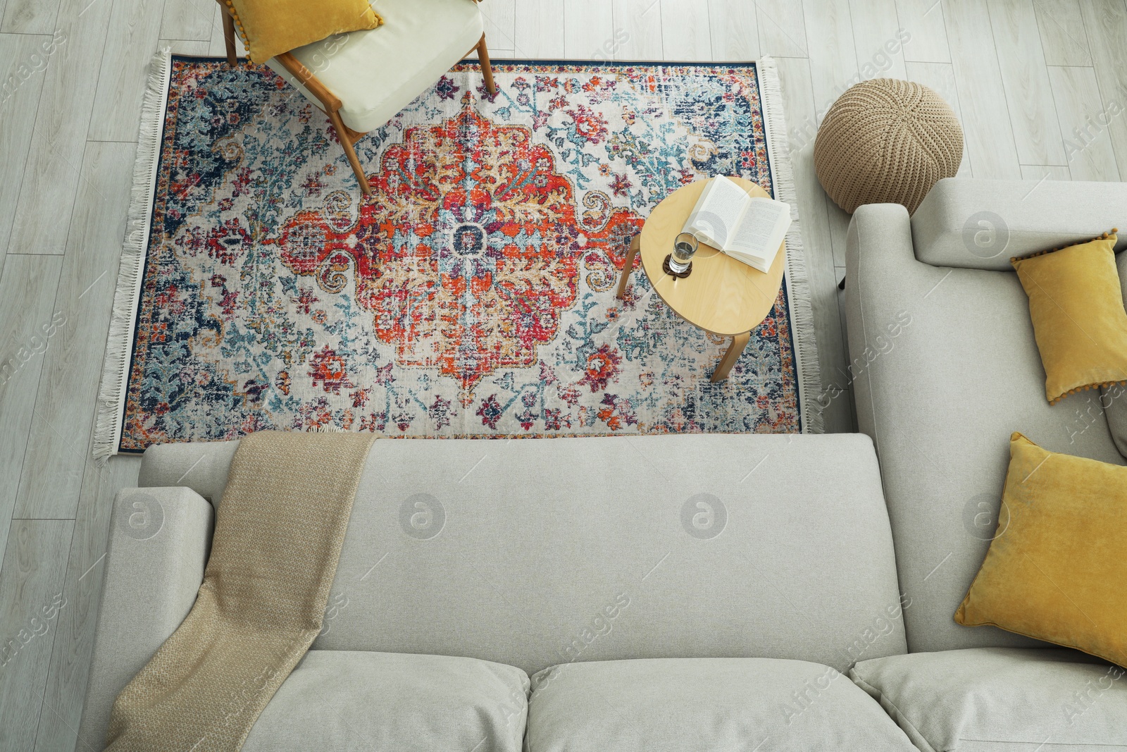 Photo of Stylish living room with beautiful carpet and furniture, top view. Interior design