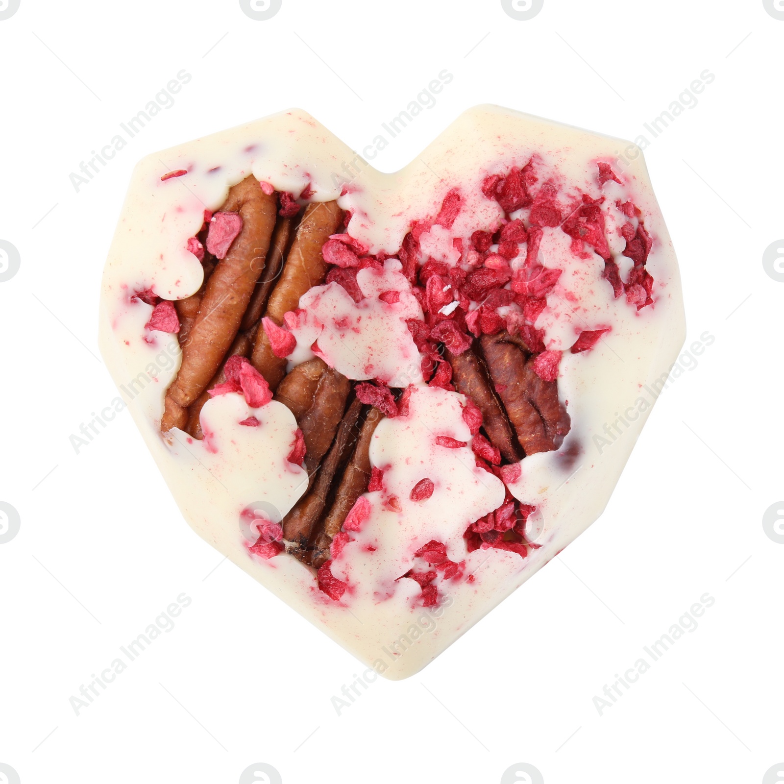 Photo of Tasty chocolate heart shaped candy with nuts on white background, top view