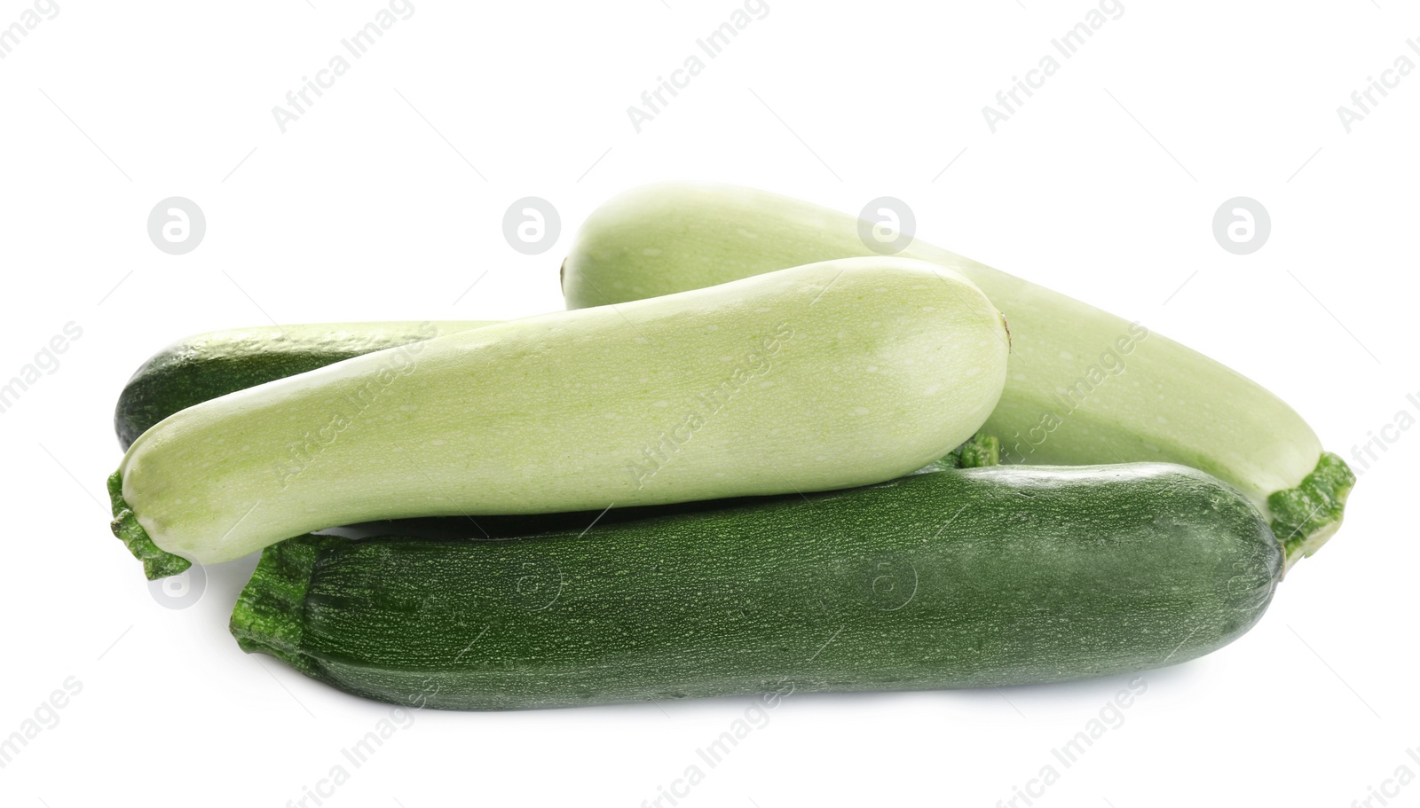 Photo of Fresh ripe green zucchinis isolated on white