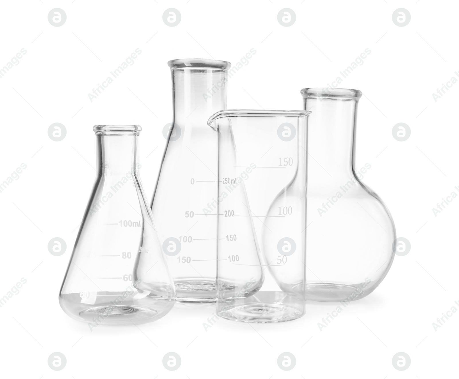 Photo of Many laboratory flasks and beaker isolated on white