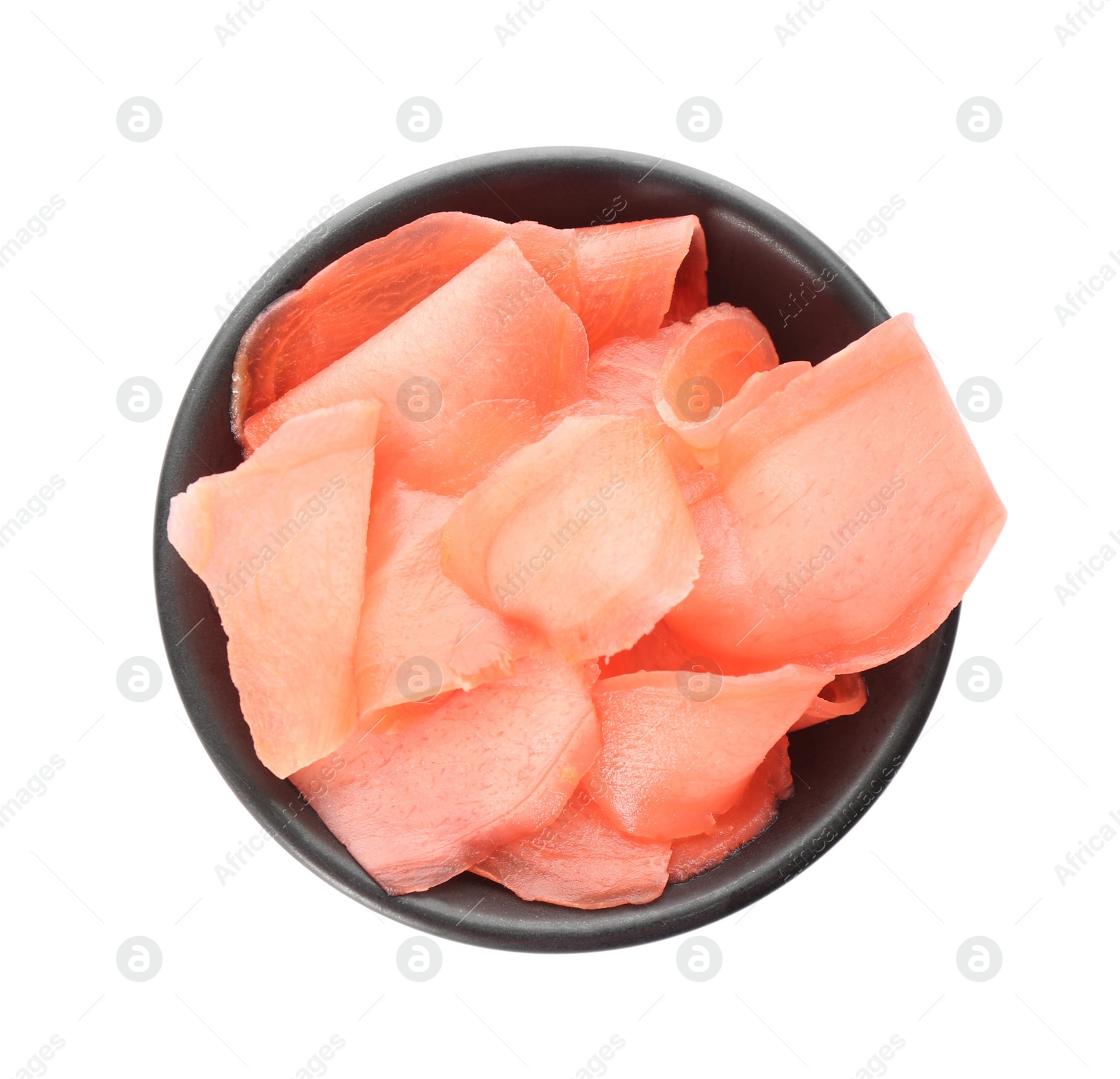 Photo of Pickled ginger in bowl isolated on white, top view