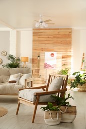 Photo of Light room interior with stylish wooden furniture. Idea for design