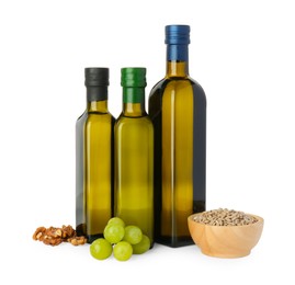 Photo of Vegetable fats. Bottles of different cooking oils and ingredients isolated on white