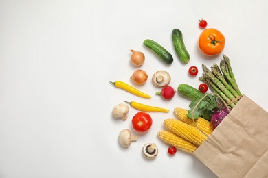 Photo of Flat lay composition with fresh vegetables and space for text on white background